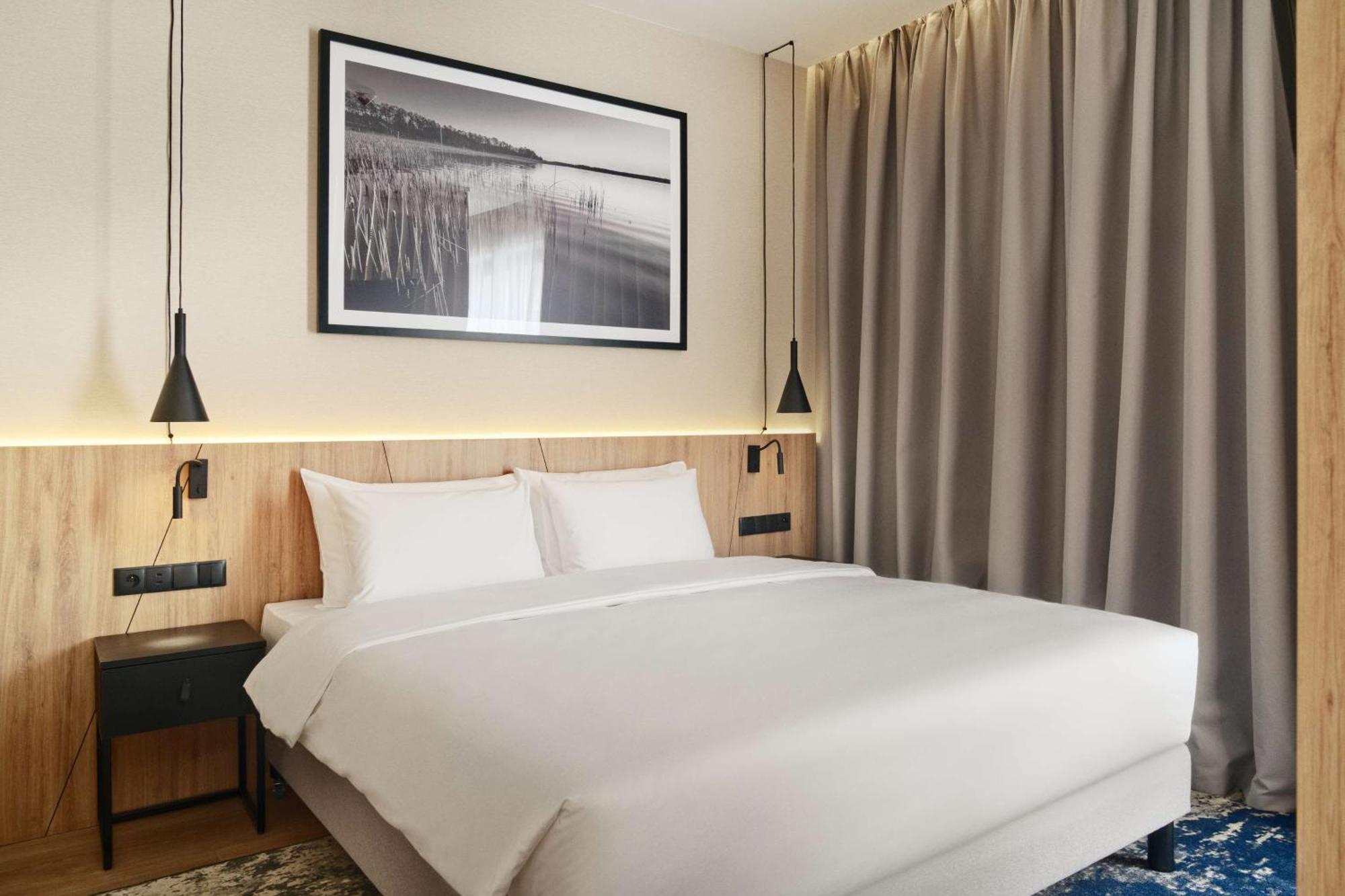 Radisson Blu Resort & Conference Center, Ostroda Mazury Εξωτερικό φωτογραφία A bedroom at the hotel